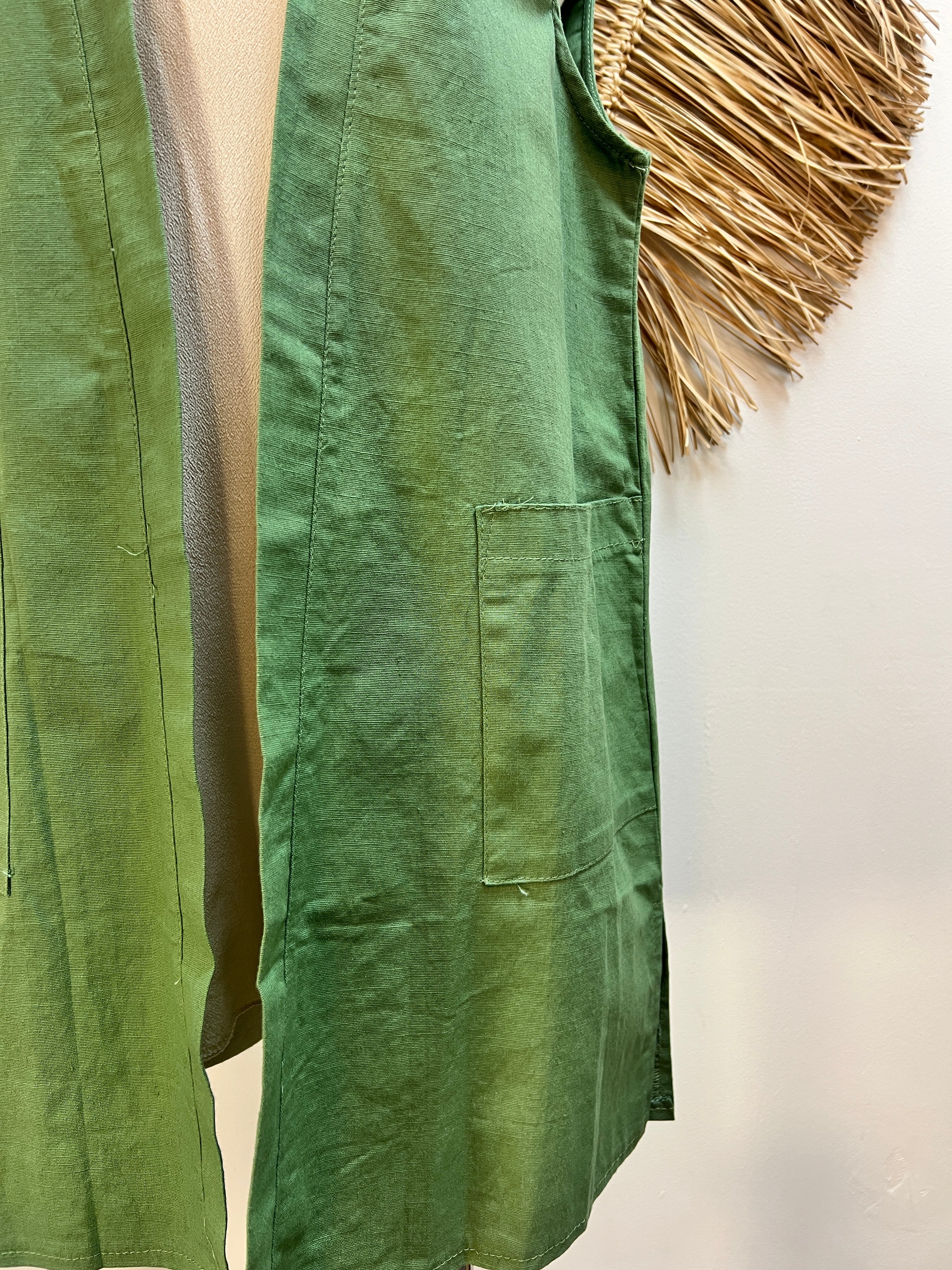 Chaleco con bolsillo verde