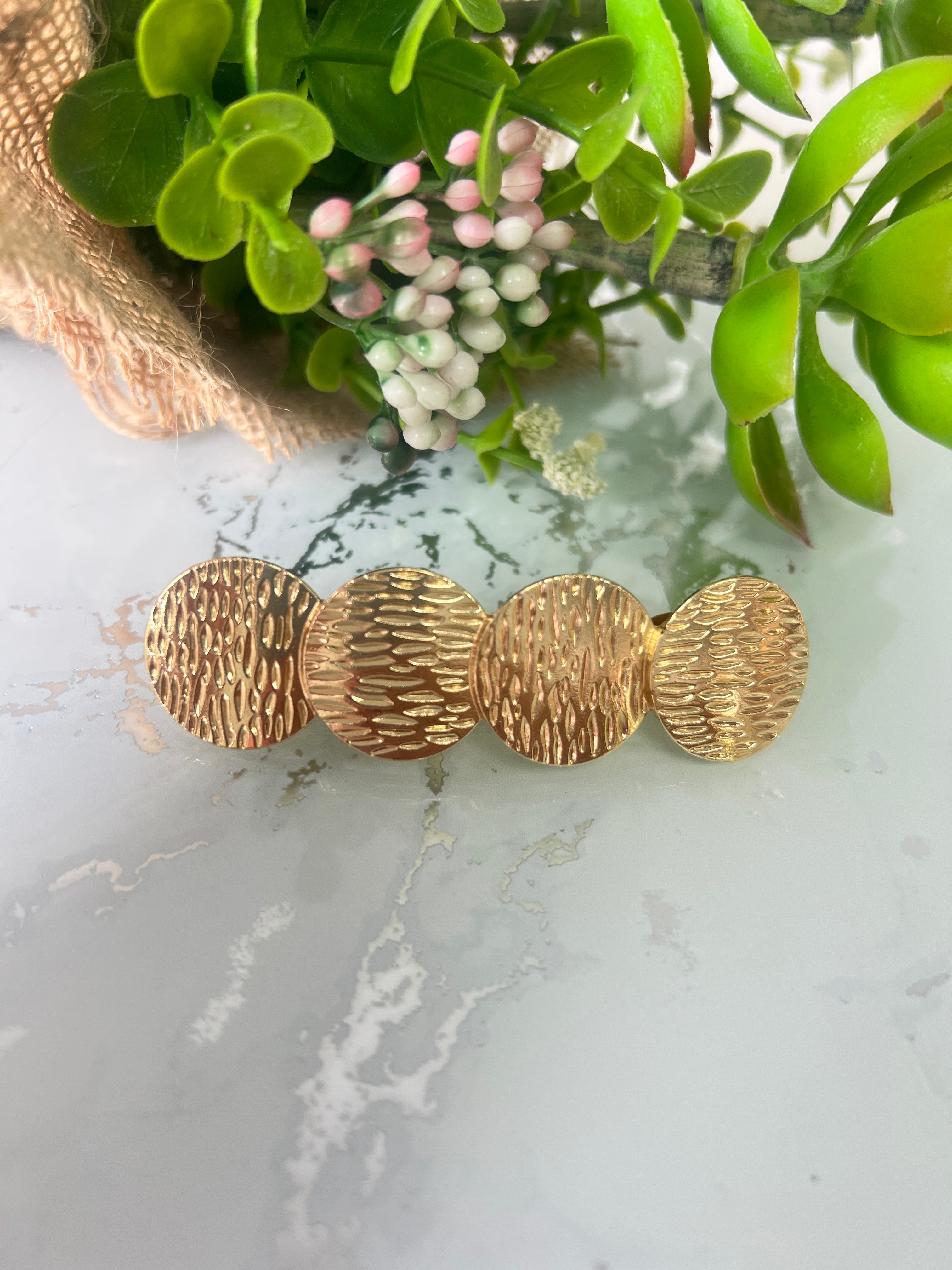 Broche círculos cromados