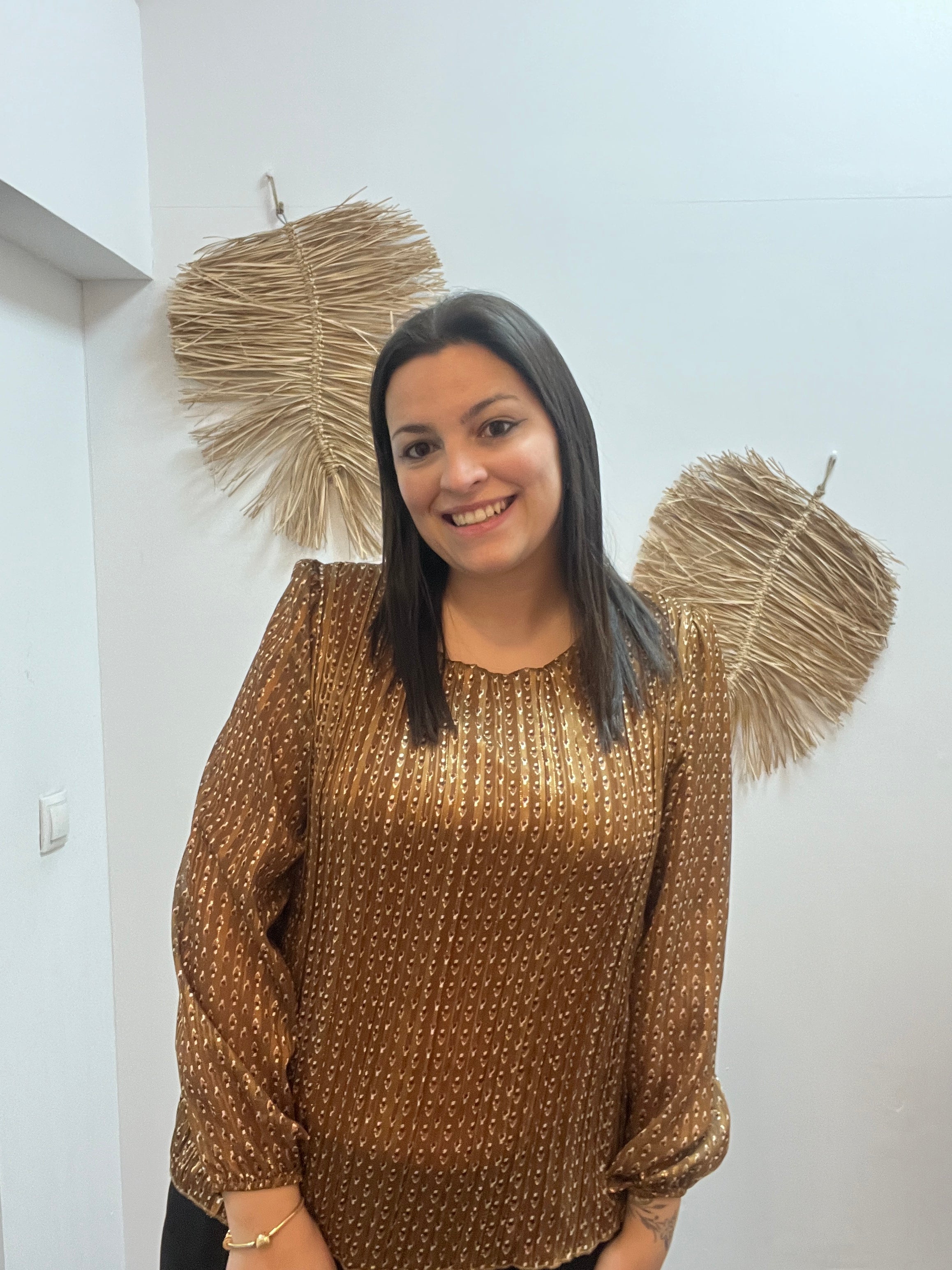 Blusa plisada estampada