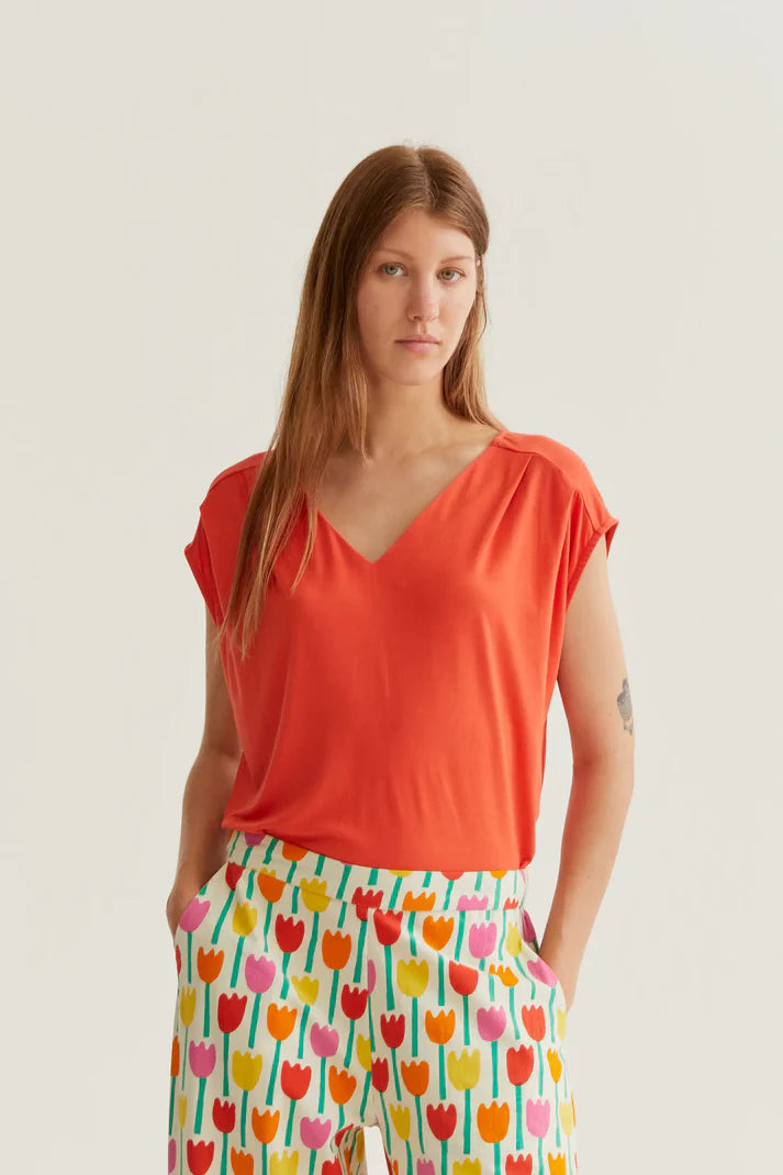 Camiseta rojo manga sisa compañía Fantástica