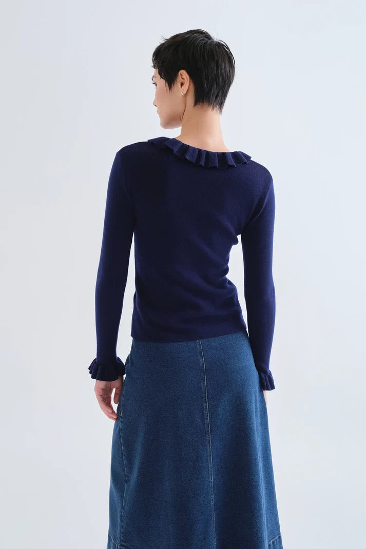 top con volantes punto azul marino