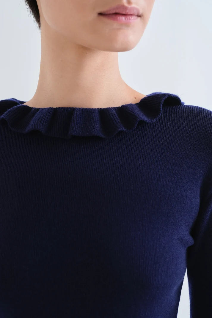 Top con volantes punto azul marino Compañía Fantástica
