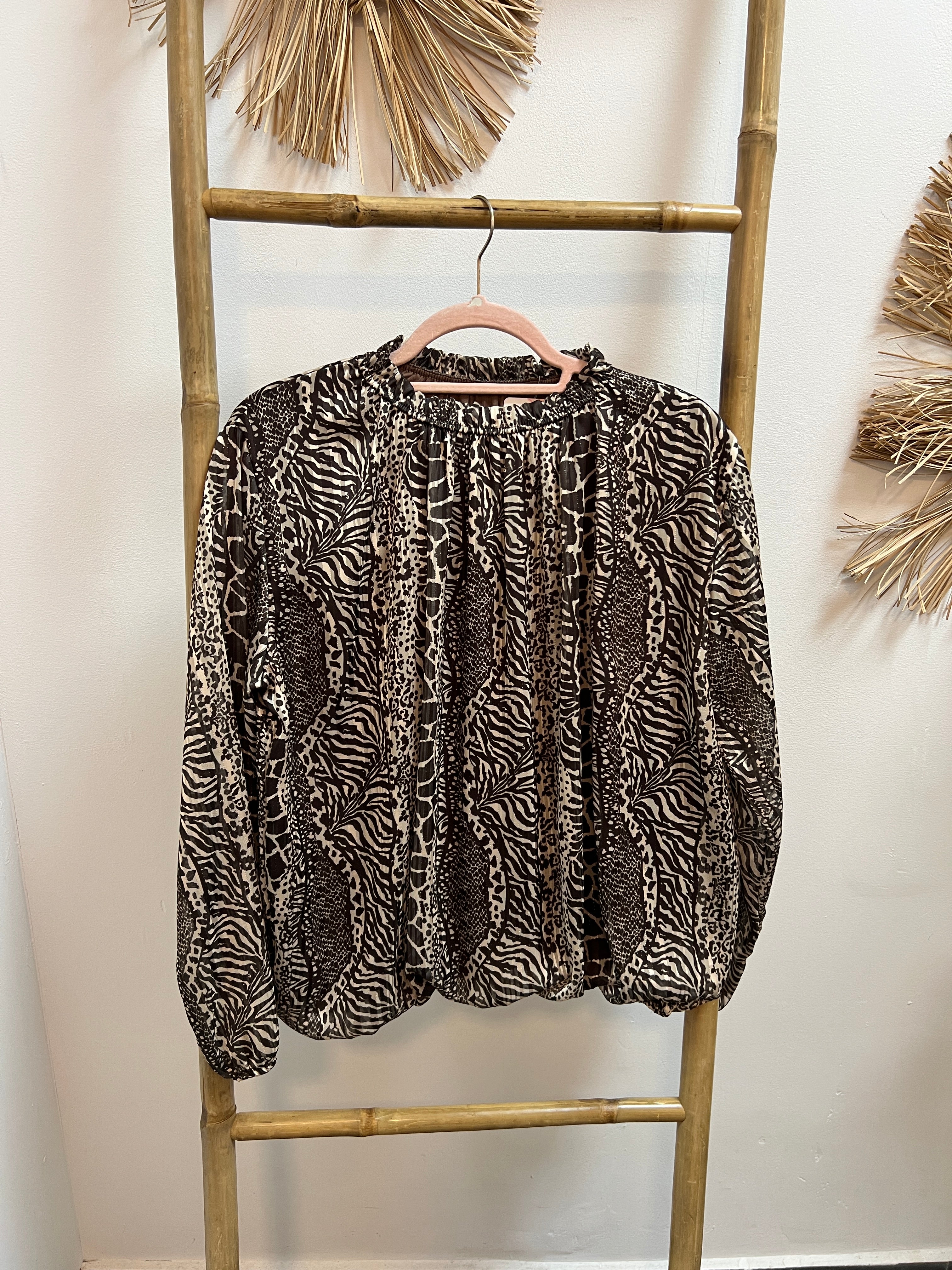 Blusa animal print con brillo