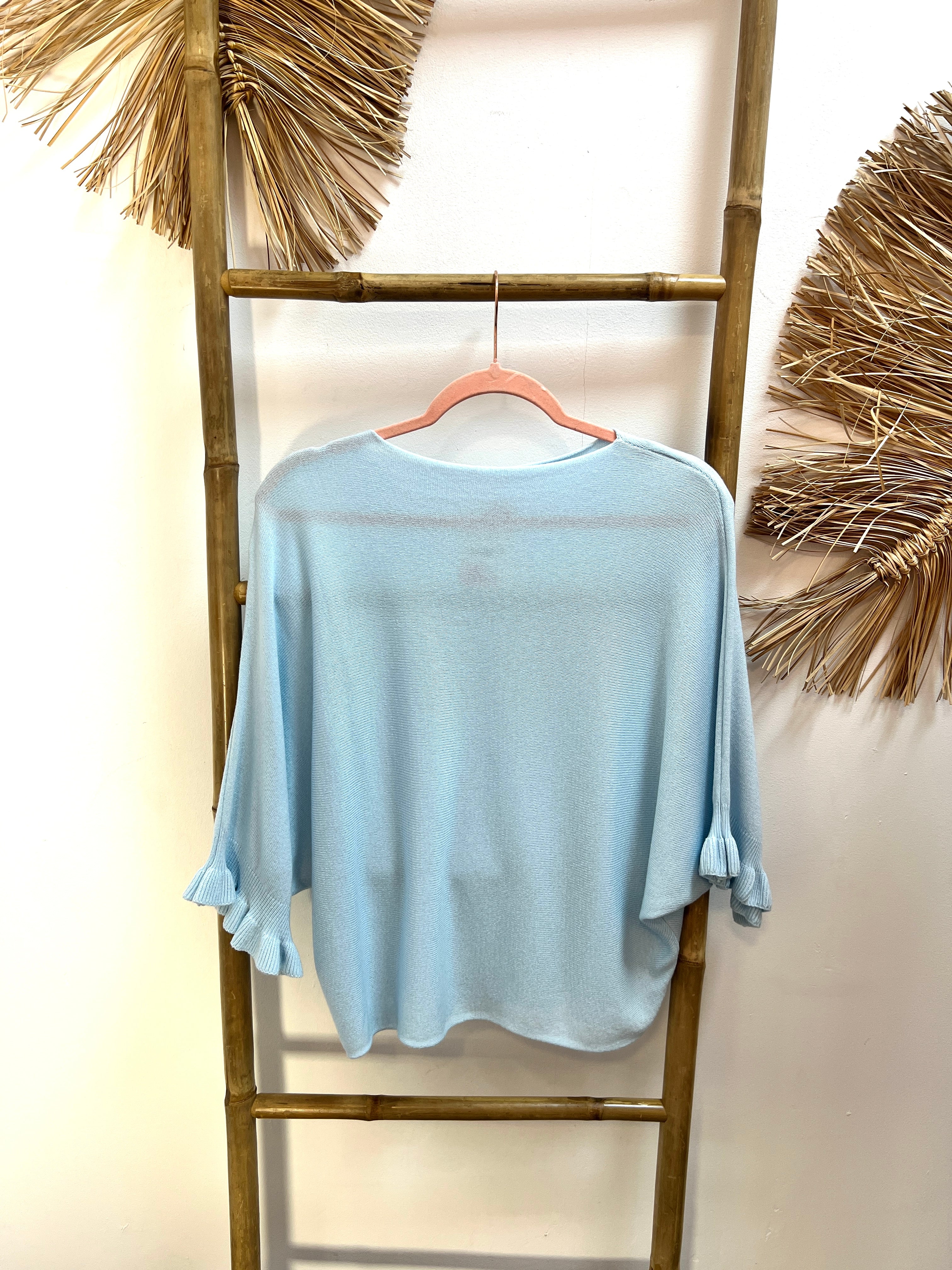 Jersey ancho manga volante