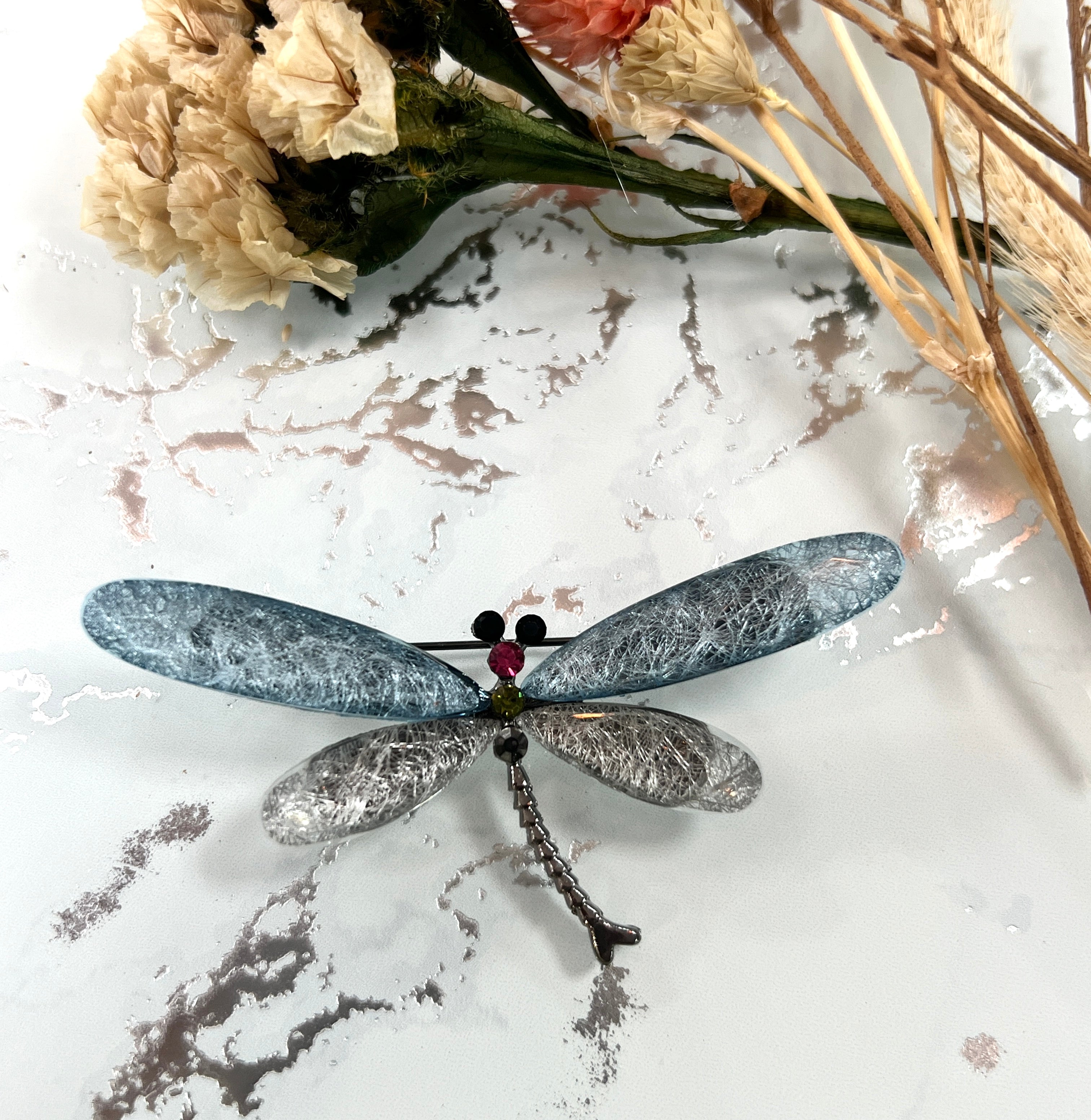 Broche libélula esmeralda