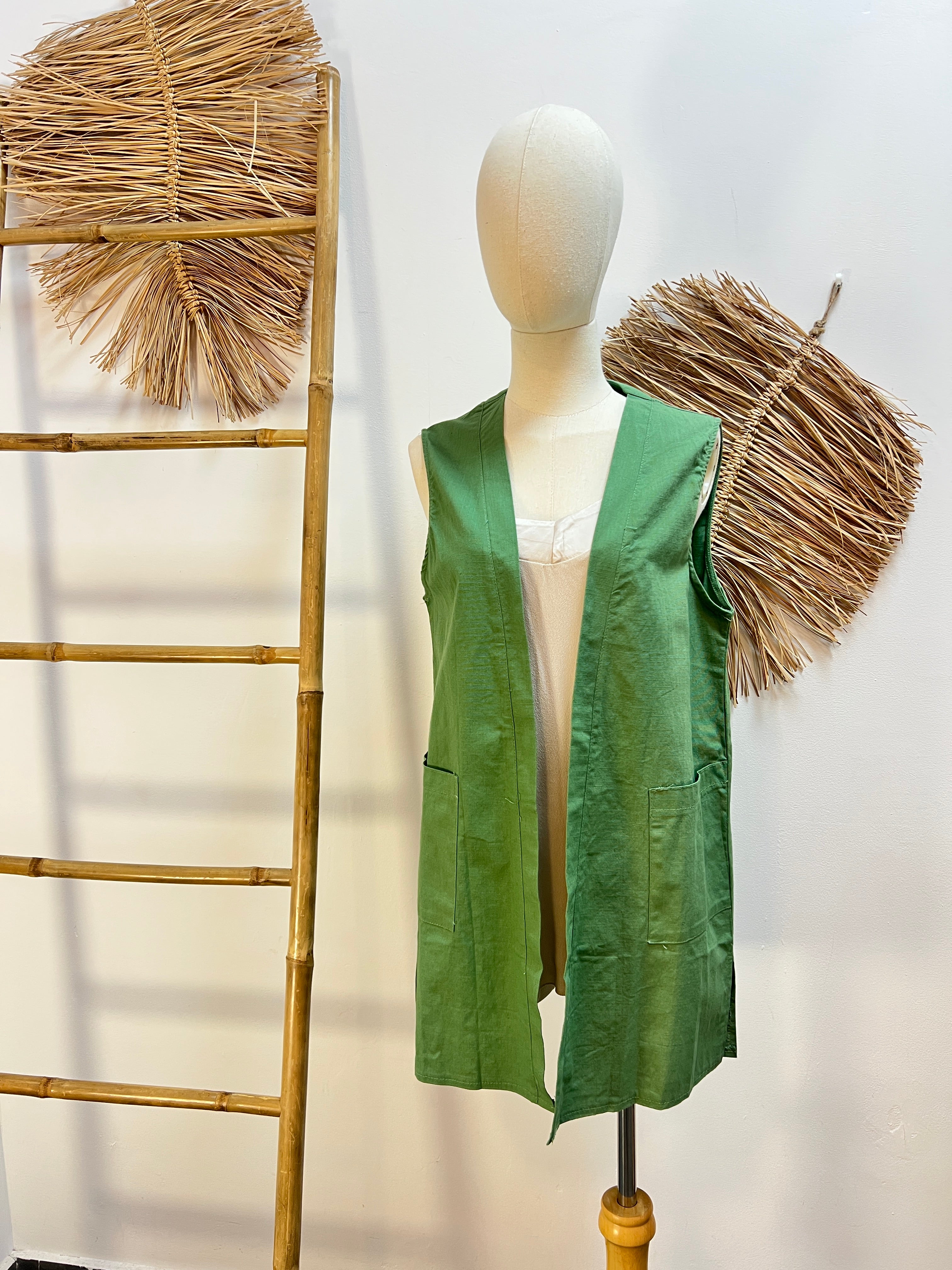 Chaleco con bolsillo verde