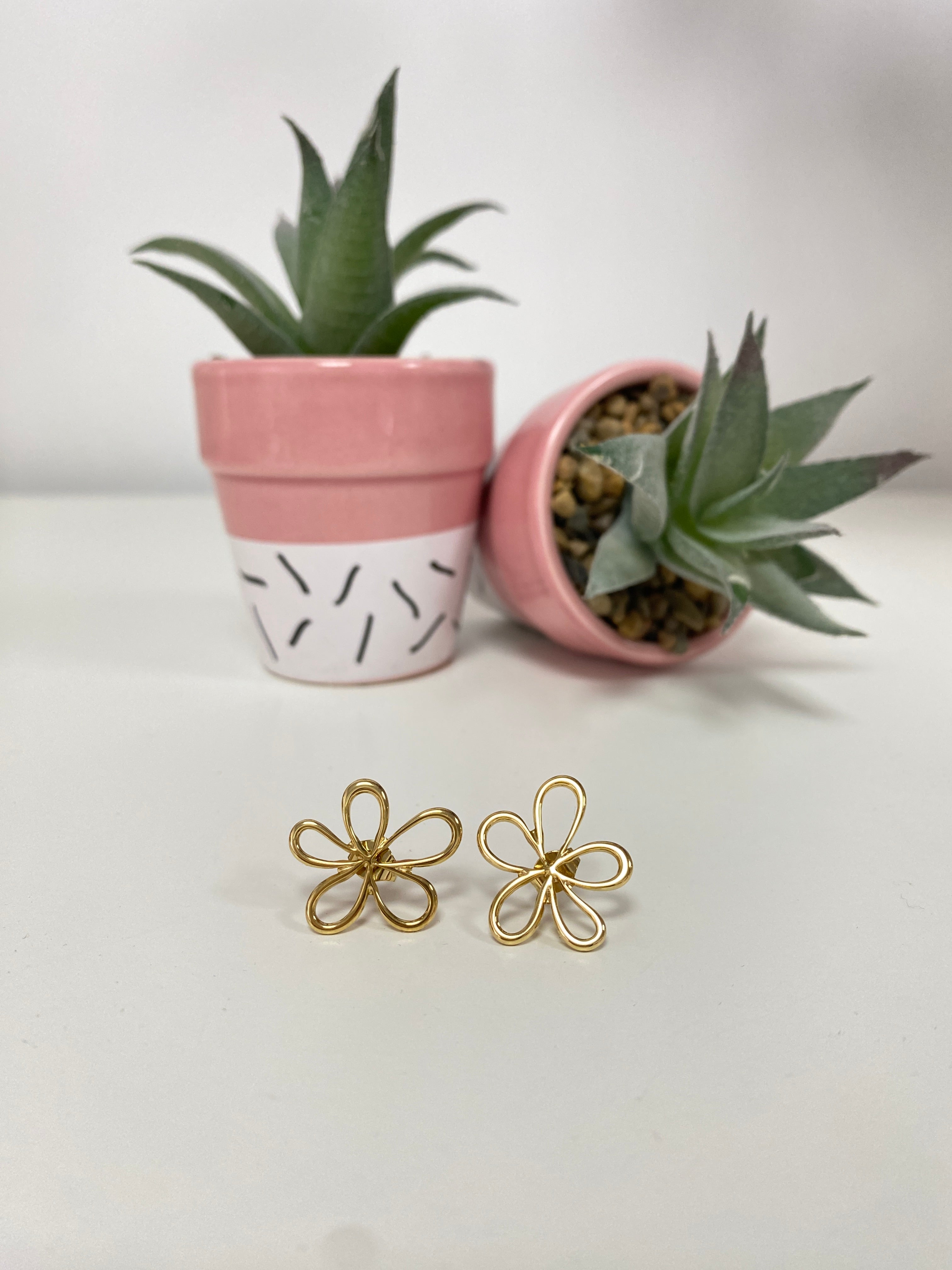 Pendientes flor silueta