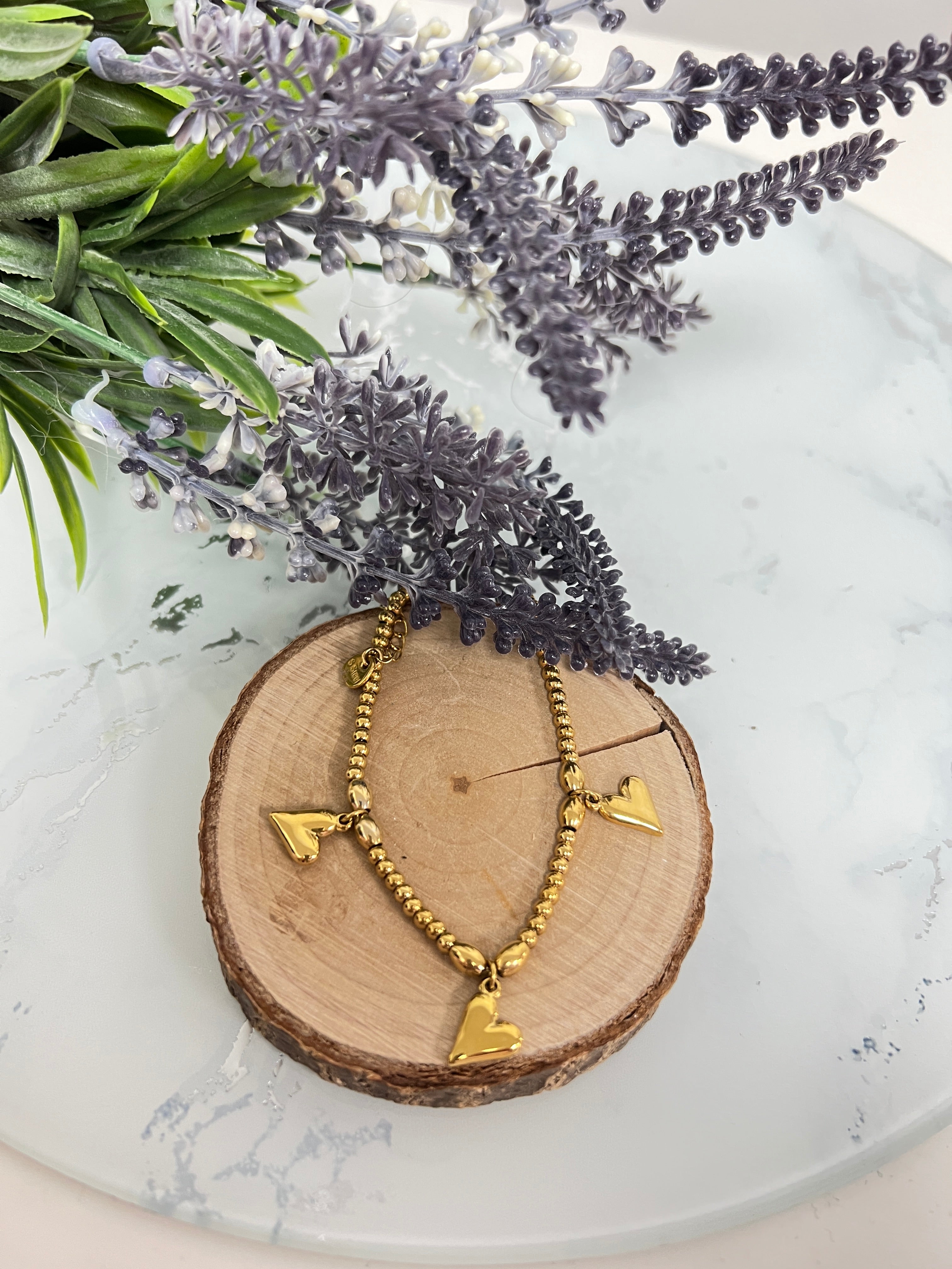Pulsera triple corazón